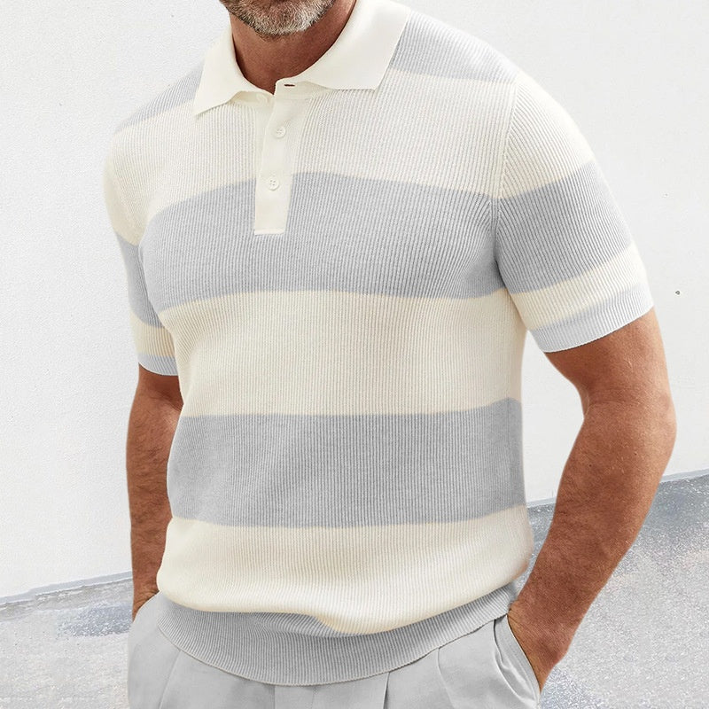 Man wearing a striped polo shirt with a white background